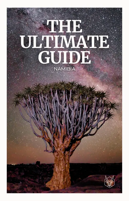 Digital eBook cover of “The Ultimate Namibia Travel Guide” by Kudu Kompass, featuring Namibia’s red desert dunes, winding rivers, and wildlife silhouettes.